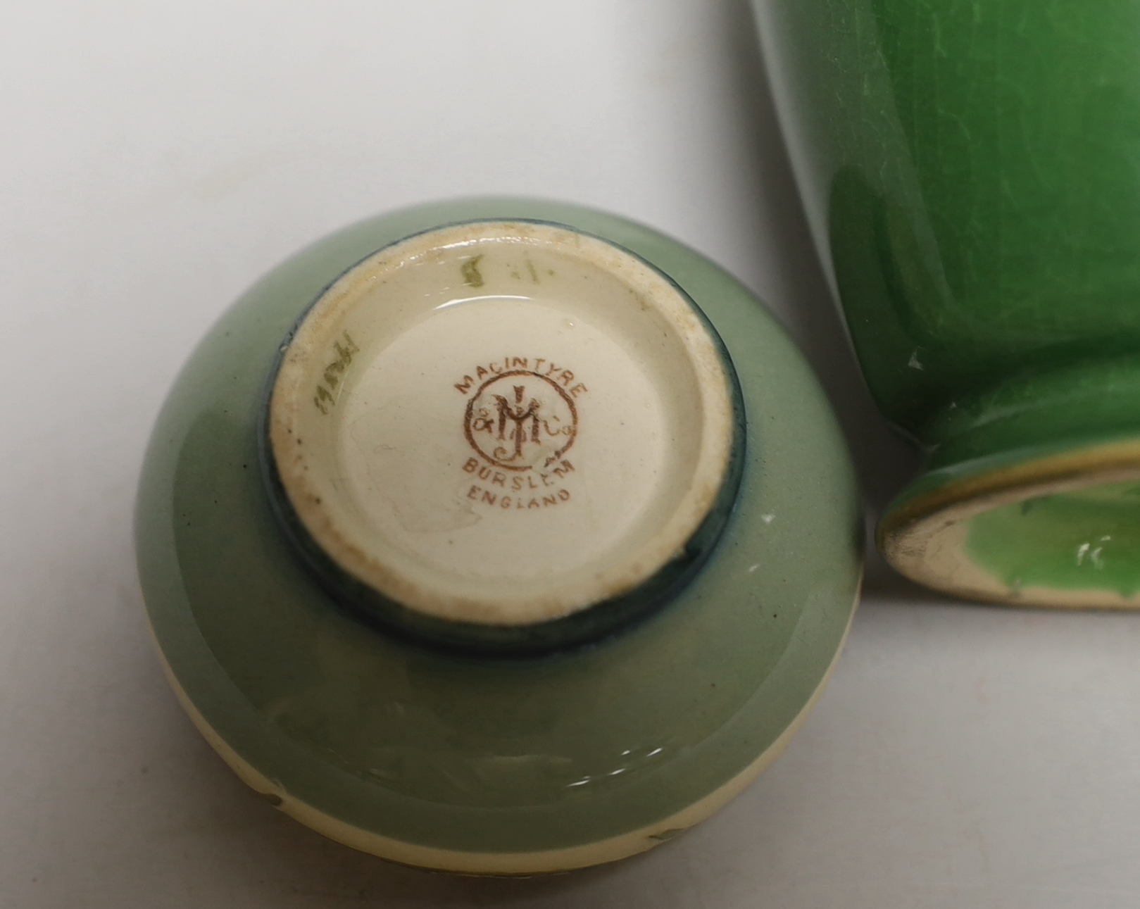 A Moorcroft for Liberty & Co. Flamminian ware green-glazed vase and a Mcintyre salt, tallest 13cm